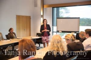 Business in Heels co-founder Lisa Sweeny gives presentation to a group of women in boardroom