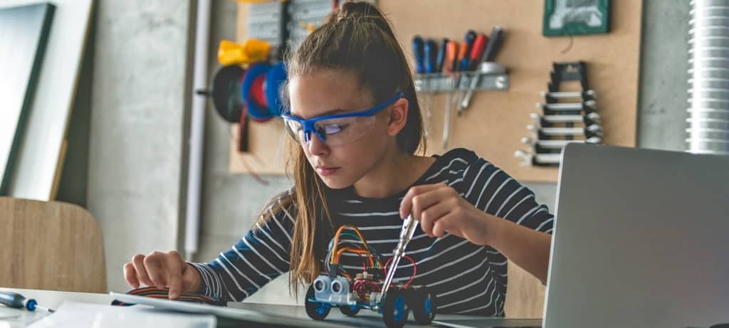 Girl gets involved with STEM while working on a small motorised car