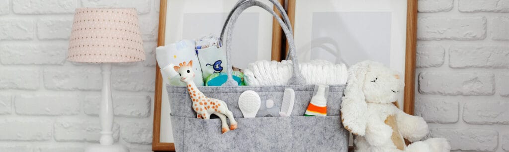 handbag with baby essentials in it