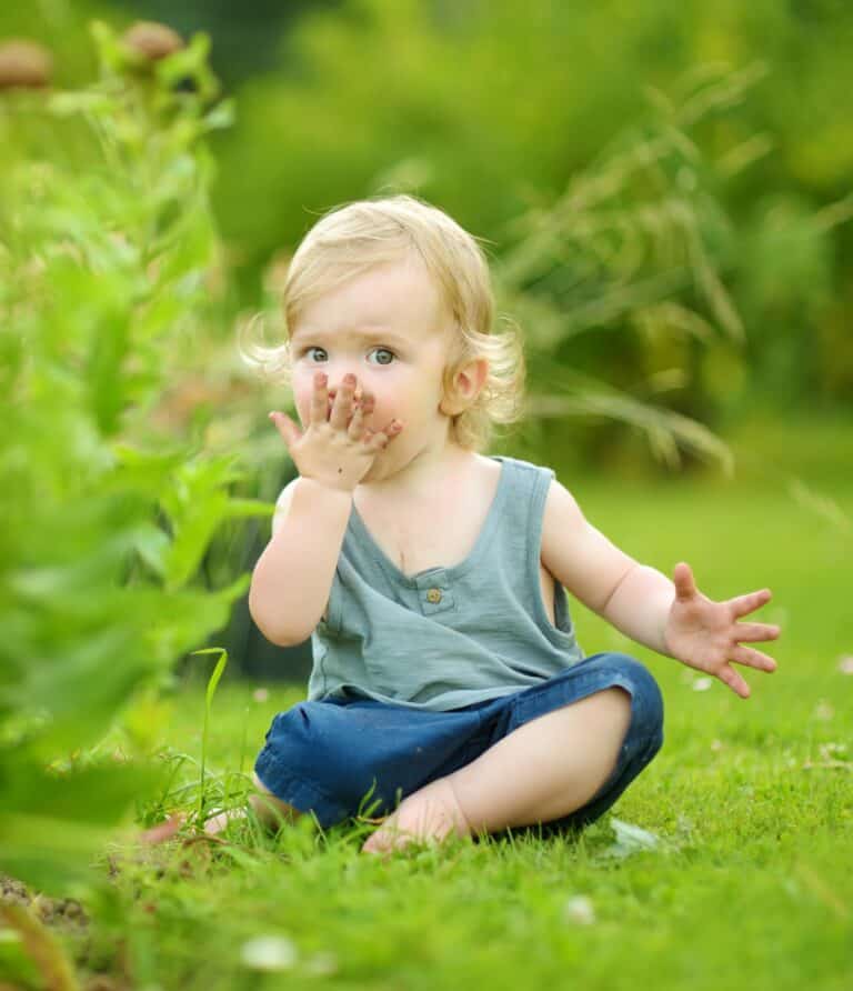 toddler eating dirt